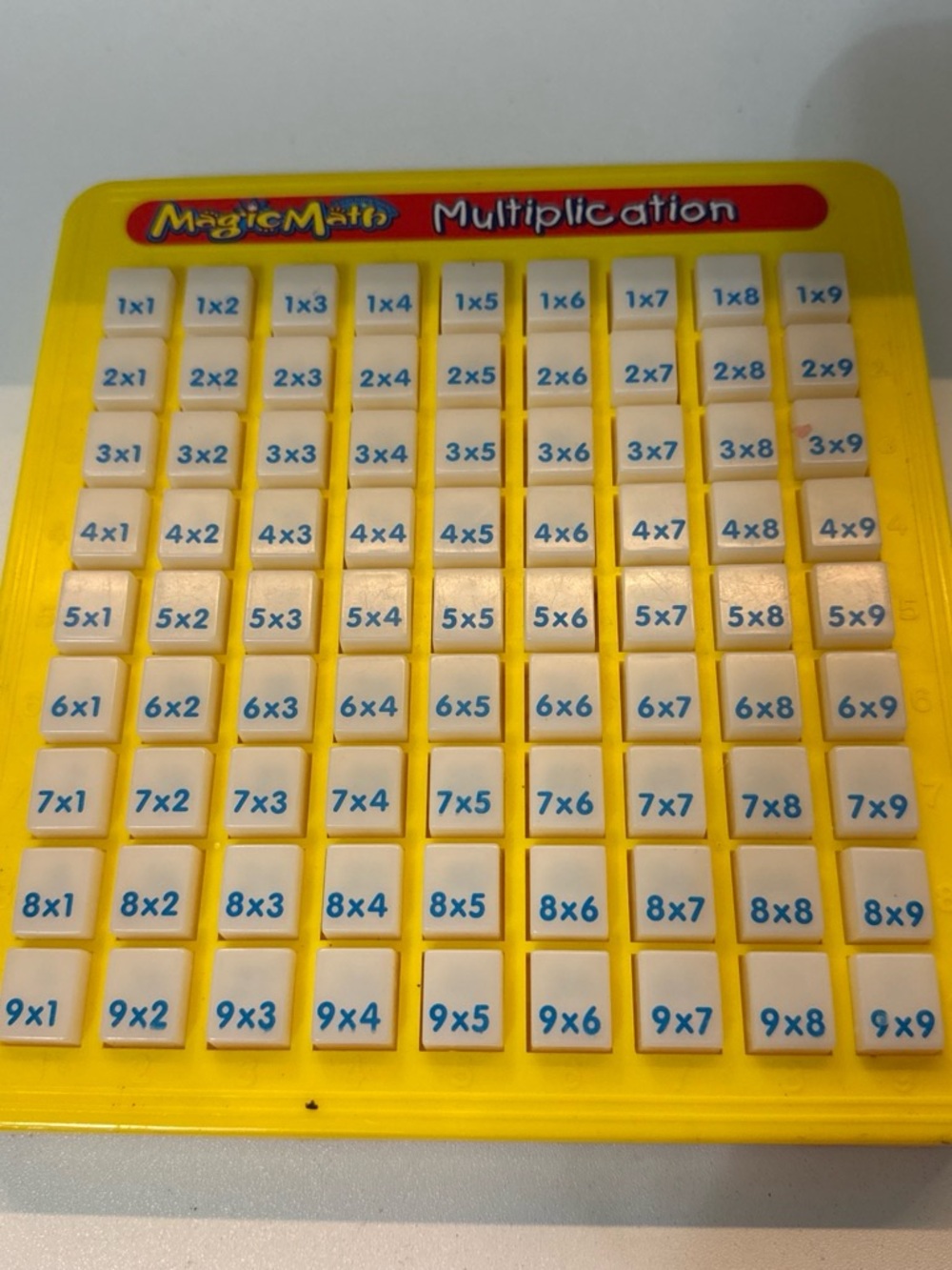 Magic Yellow Multiplication Learning Board with White and Blue Tiles